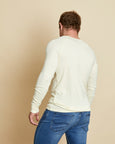 Man wearing soft Australian Merino Wool long sleeve t.shirt in natural. Designed to be worn next to the skin either as a base layer/thermal style or as a t.shirt on its own. Australian Made at Woolerina's workrooms at Forbes in central west NSW.