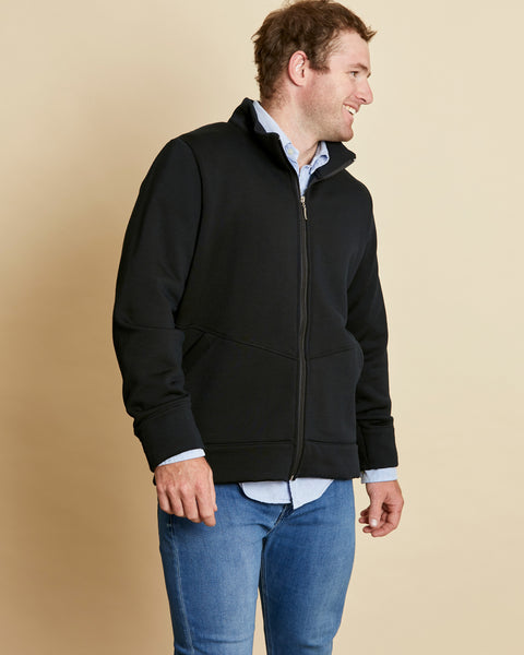 Man wearing a soft Australian Merino wool jacket in black. Designed to be worn over other layers. Made in Australia at Woolerina's workroom at Forbes in central west NSW.