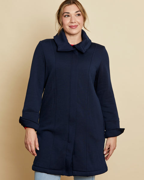 Woman wearing soft Australian Merino wool 3/4 length, full zip jacket in navy. Designed to be worn over other layers, as a coat. This style is perfect for layering. Made in Australia at Woolerina's workrooms at Forbes in central west NSW.