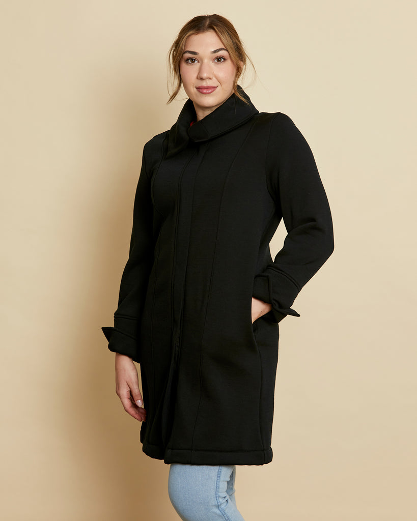 Woman wearing soft Australian Merino wool 3/4 length, full zip jacket in black. Designed to be worn over other layers, as a coat. This style is perfect for layering. Made in Australia at Woolerina's workrooms at Forbes in central west NSW.