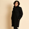 Woman wearing soft Australian Merino wool 3/4 length, full zip jacket in black. Designed to be worn over other layers, as a coat. This style is perfect for layering. Made in Australia at Woolerina's workrooms at Forbes in central west NSW.