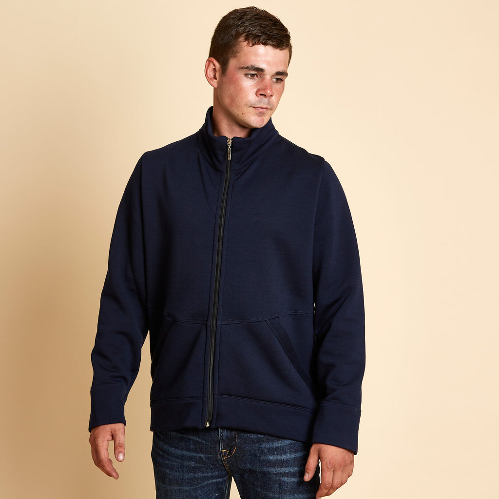 Man wearing a soft Australian Merino wool jacket in navy. Designed to be worn over other layers. Made in Australia at Woolerina's workroom at Forbes in central west NSW.