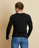 Man wearing soft Australian Merino Wool long sleeve t.shirt in black. Designed to be worn next to the skin either as a base layer/thermal style or as a t.shirt on its own. Australian Made at Woolerina's workrooms at Forbes in central west NSW.