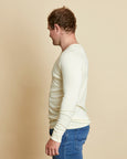 Man wearing soft Australian Merino Wool long sleeve t.shirt in natural. Designed to be worn next to the skin either as a base layer/thermal style or as a t.shirt on its own. Australian Made at Woolerina's workrooms at Forbes in central west NSW.