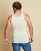 Man wearing soft Australia Merino wool sleeveless singlet in natural. Designed to wear next to the skin as a base layer/thermal style, under other layers. Made in Australia at Woolerina's workrooms at Forbes in central west NSW.