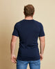 Man wearing soft Australia Merino wool short sleeve V neck t.shirt in navy. Designed to wear next to the skin as a base layer/thermal or on its own as a t.shirt style. Made in Australia at Woolerina's workrooms at Forbes in central west NSW.