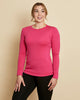 Woman wearing soft Australian Merino wool long sleeve crew neck in hot pink. Designed to wear next to the skin either as a base layer or as a t.shirt style on its own. This style is perfect for layering. Made in Australia at Woolerina's workrooms at Forbes in central west NSW.