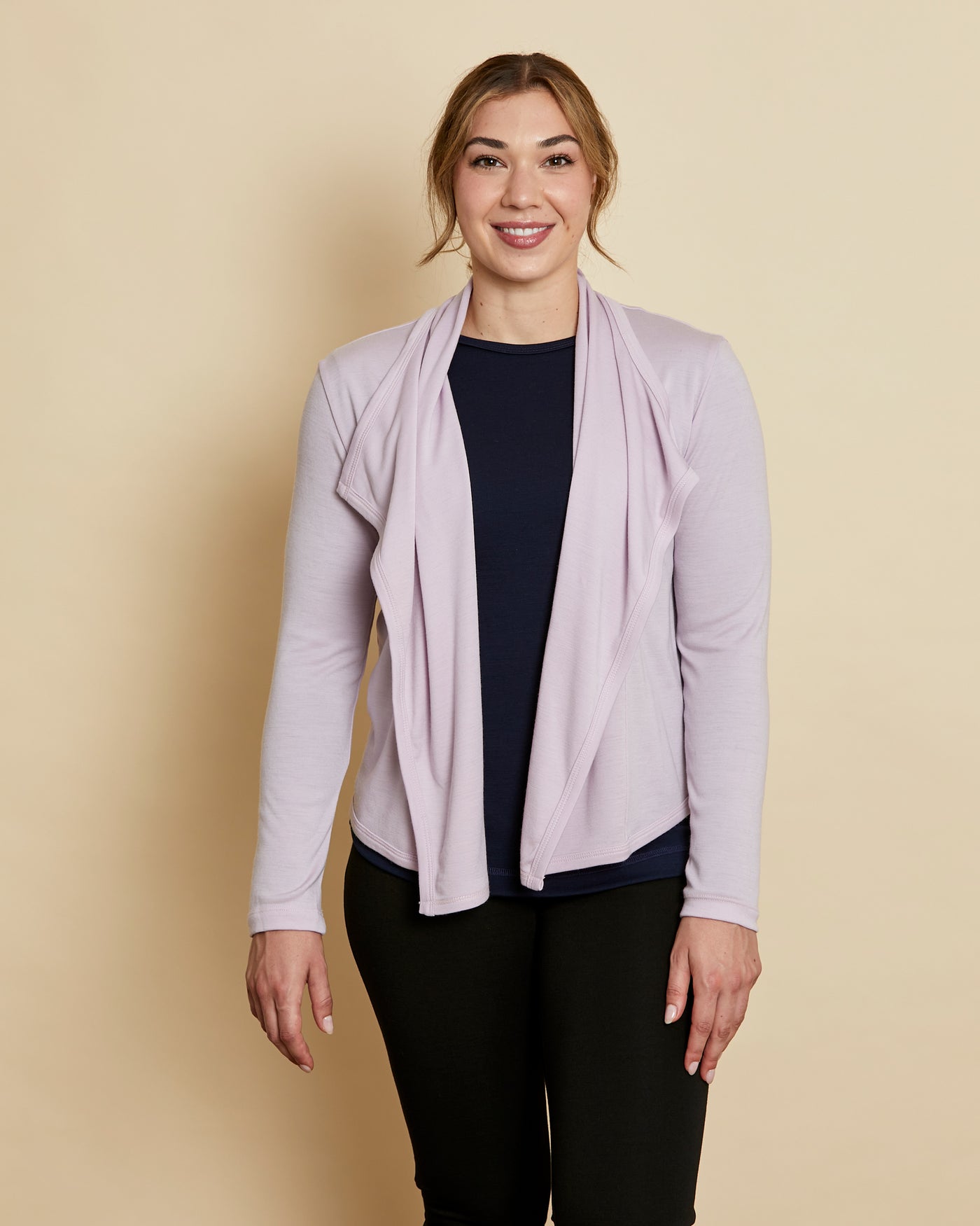 Woman wearing soft Australian Merino wool waterfall cardigan in lilac. Designed to wear over other layers as an outer layer. Made in Australia at Woolerina's workrooms at Forbes in central west NSW.
