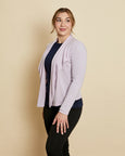 Woman wearing soft Australian Merino wool waterfall cardigan in lilac. Designed to wear over other layers as an outer layer. Made in Australia at Woolerina's workrooms at Forbes in central west NSW.