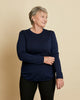 Woman wearing soft Australian Merino wool crew neck pullover in navy. Relaxed fitting, designed to wear over other layers as an outer layer or on its own next to the skin. Made in Australia at Woolerina's workrooms at Forbes in central west NSW.