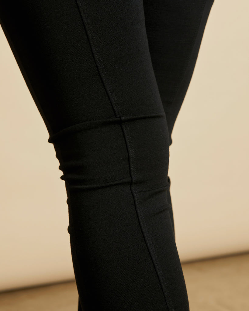 Woman wearing soft Australian Merino wool ponte pant in black. Slim fitting, with a straight leg and elastic waist. Made in Australia at Woolerina's workrooms at Forbes in central west NSW.